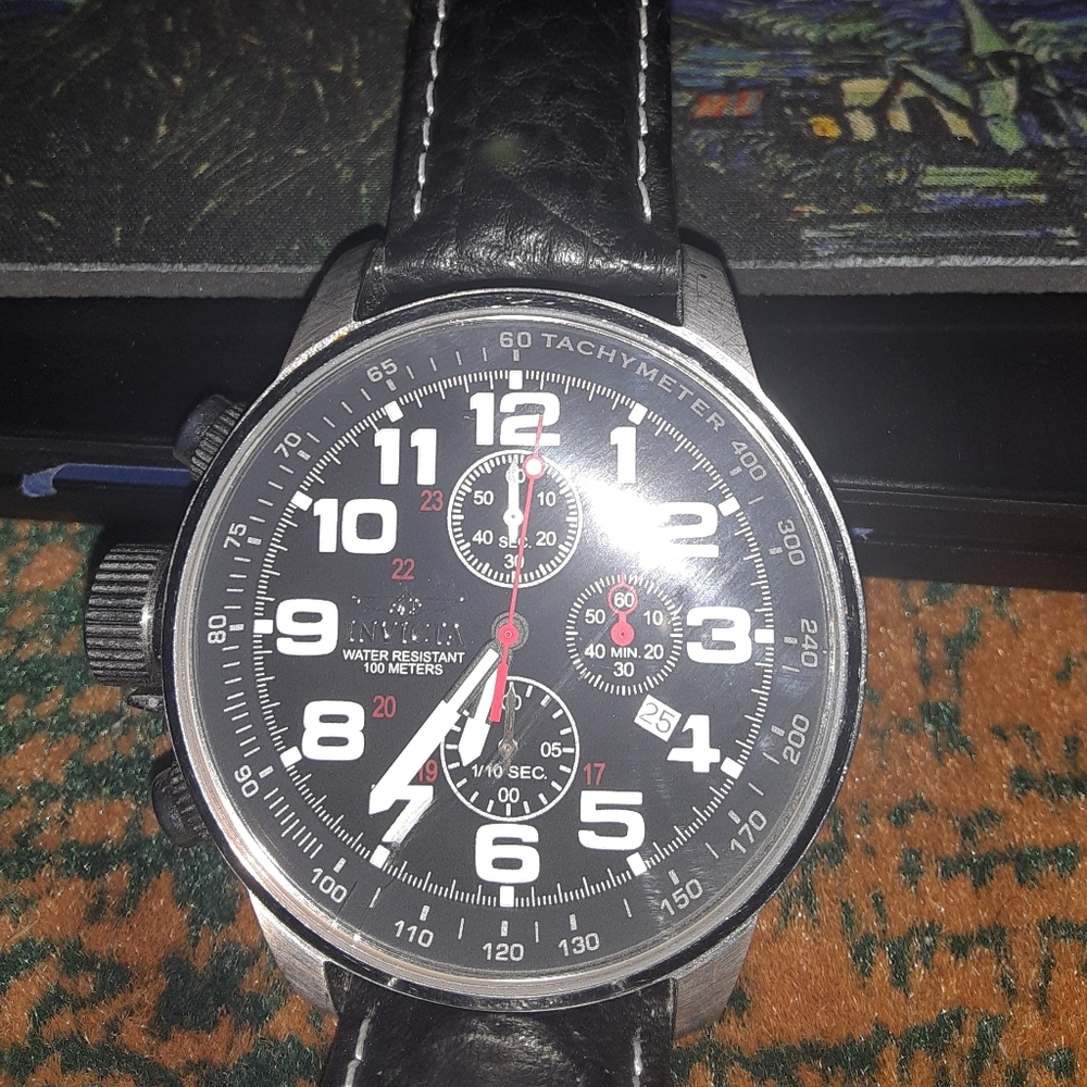 Invicta Tachymeter watch.